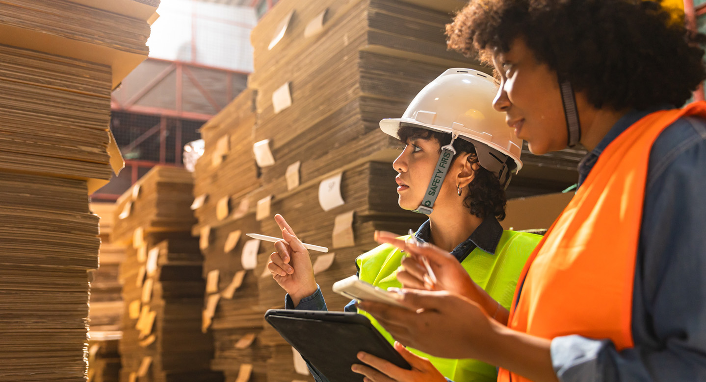 People working in packaging facility